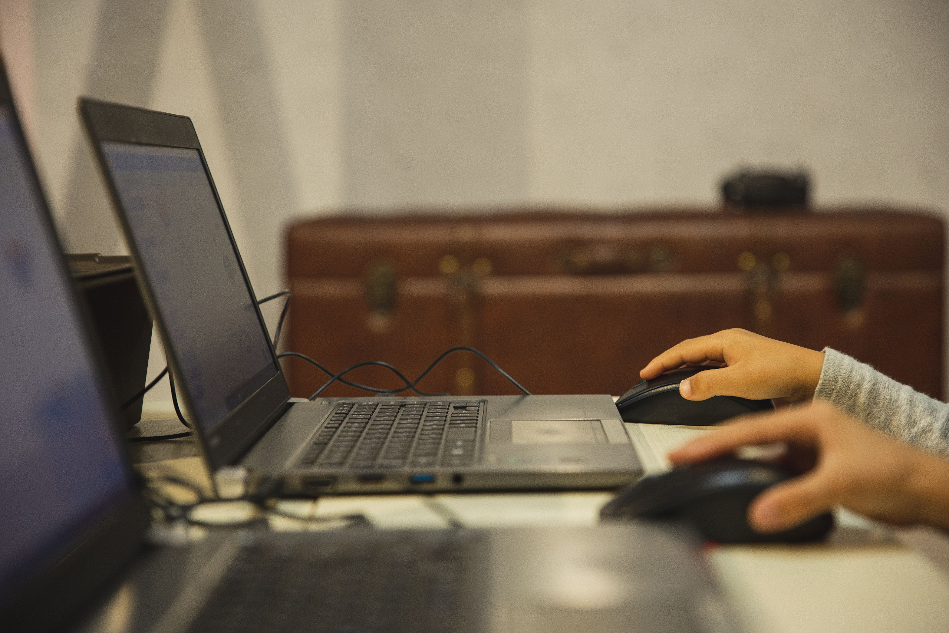 Hands working on a laptop — modern IT and software services